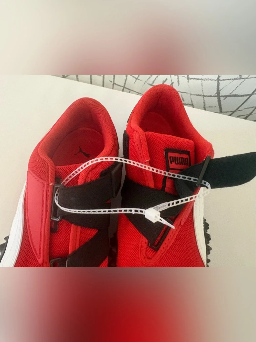 PUMA Mostro OG Sneakers. Vibrant  Red with a Unique Spike Sole.